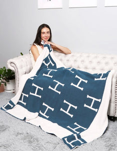 H Throw Blanket backordered Ships on or before 4/15