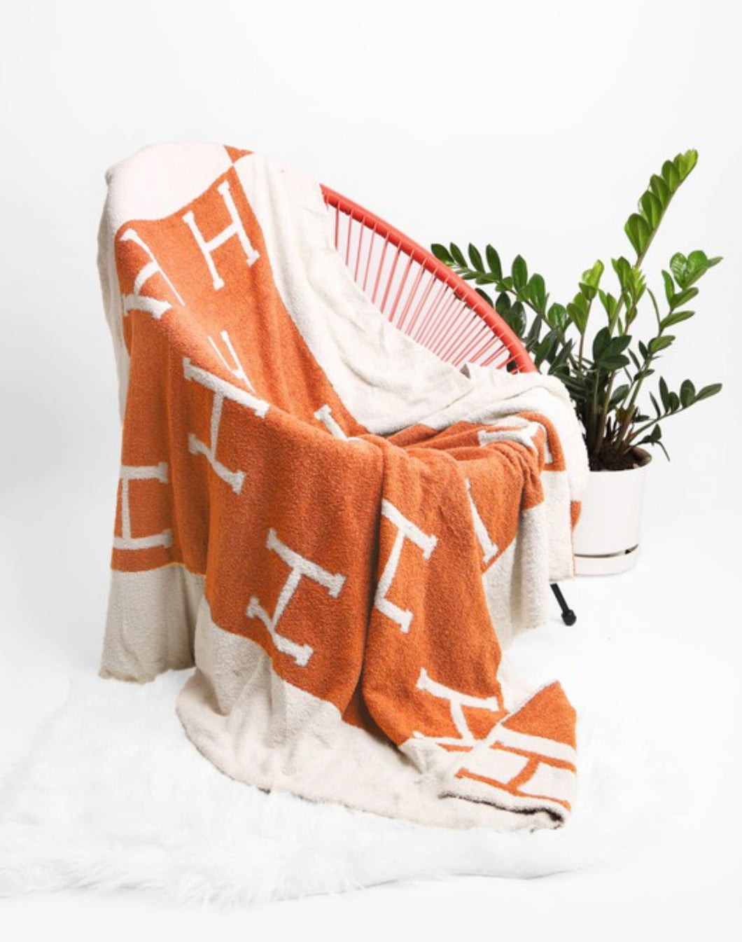 H Throw Blanket backordered Ships on or before 4/15